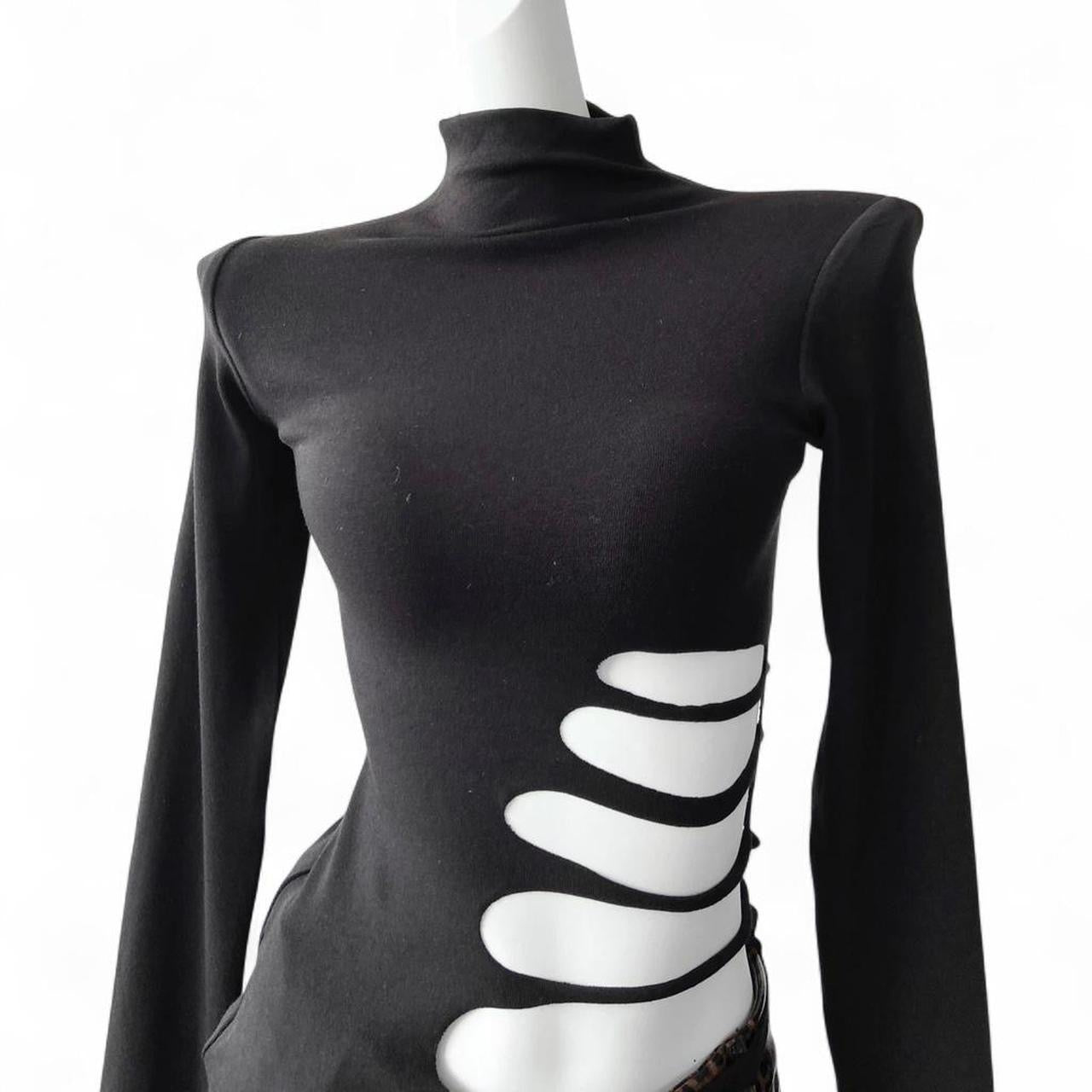 black long sleeve mock neck top with skeleton cutout