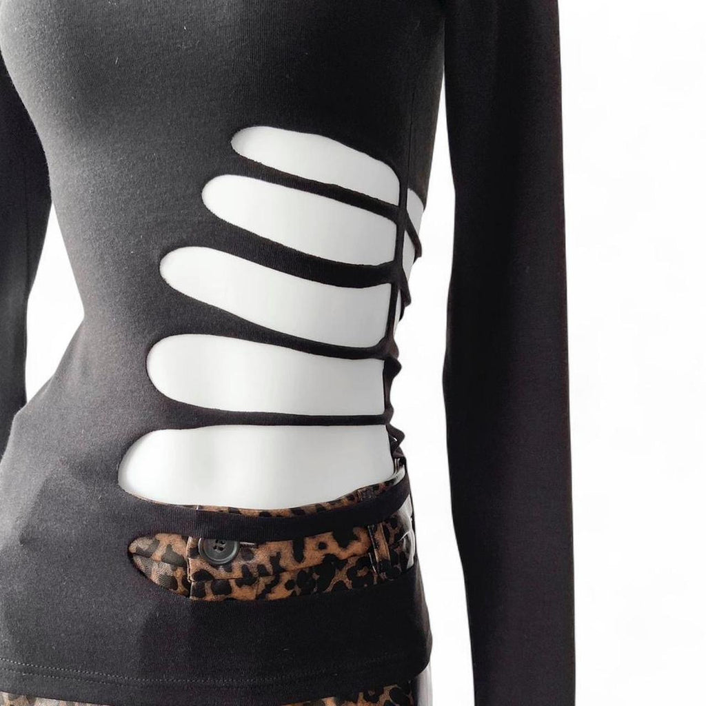 black long sleeve mock neck top with skeleton cutout