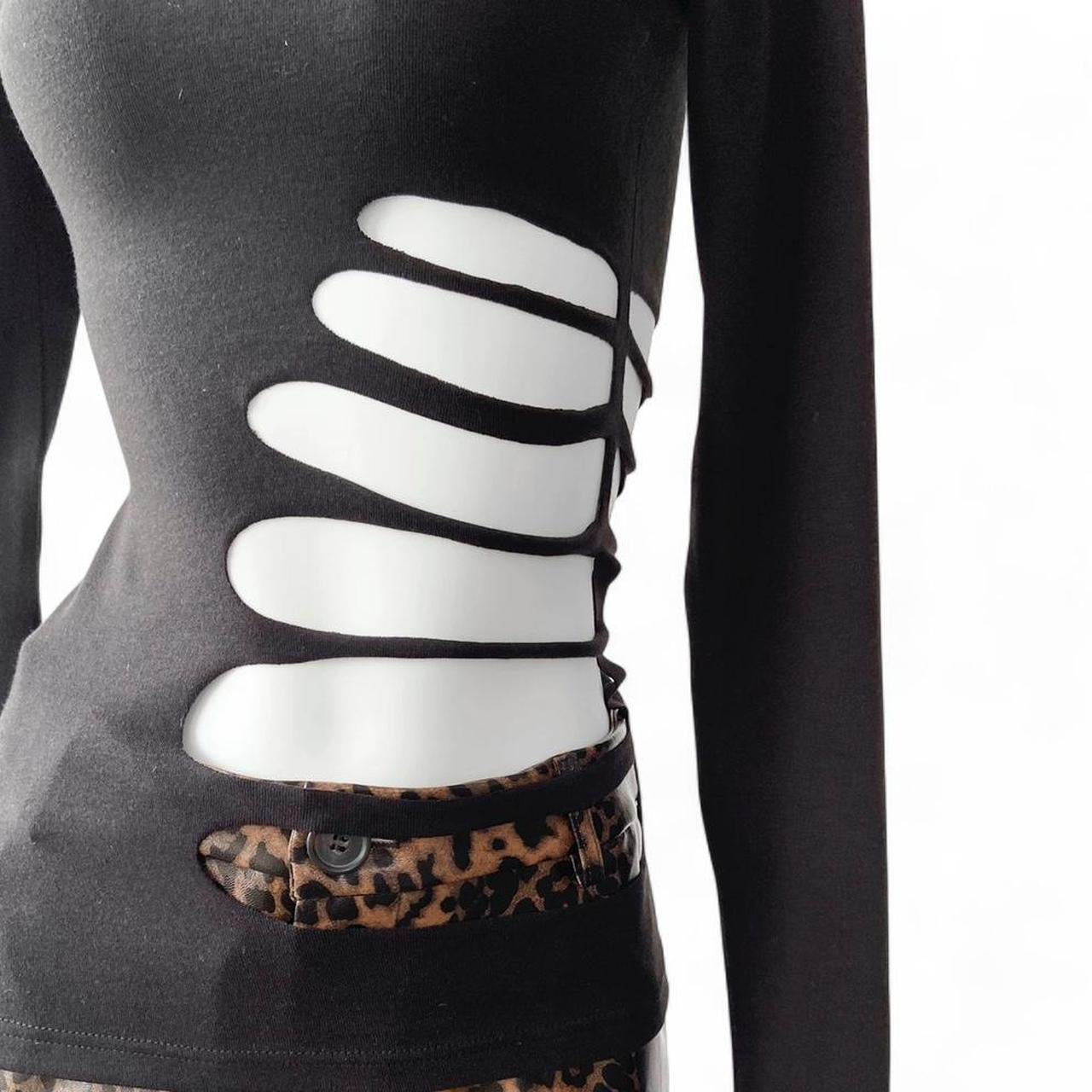 black long sleeve mock neck top with skeleton cutout