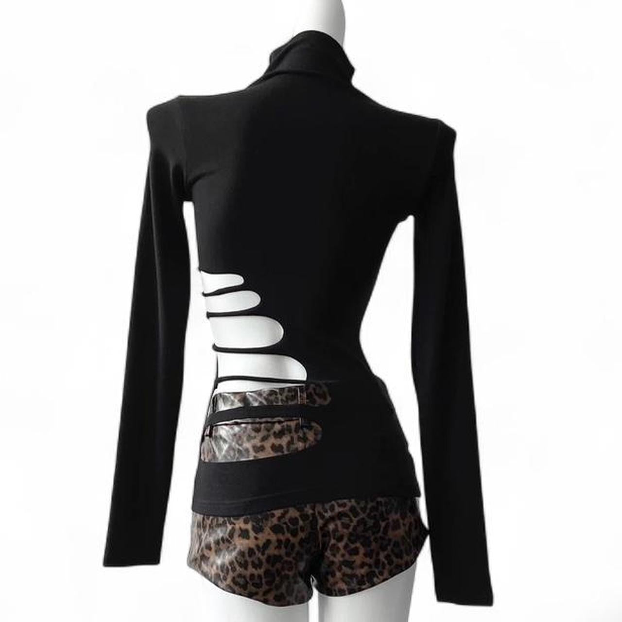 black long sleeve mock neck top with skeleton cutout
