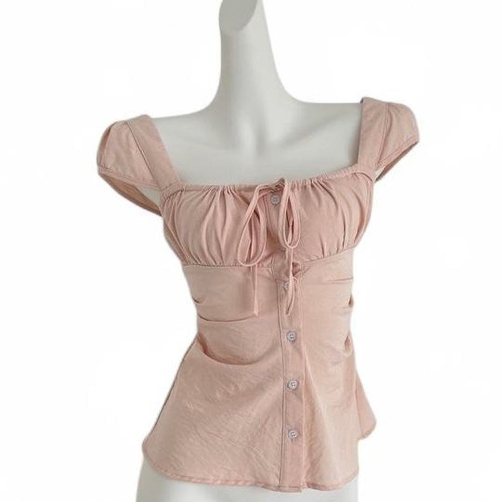 pink corset top with button up front and tie back
