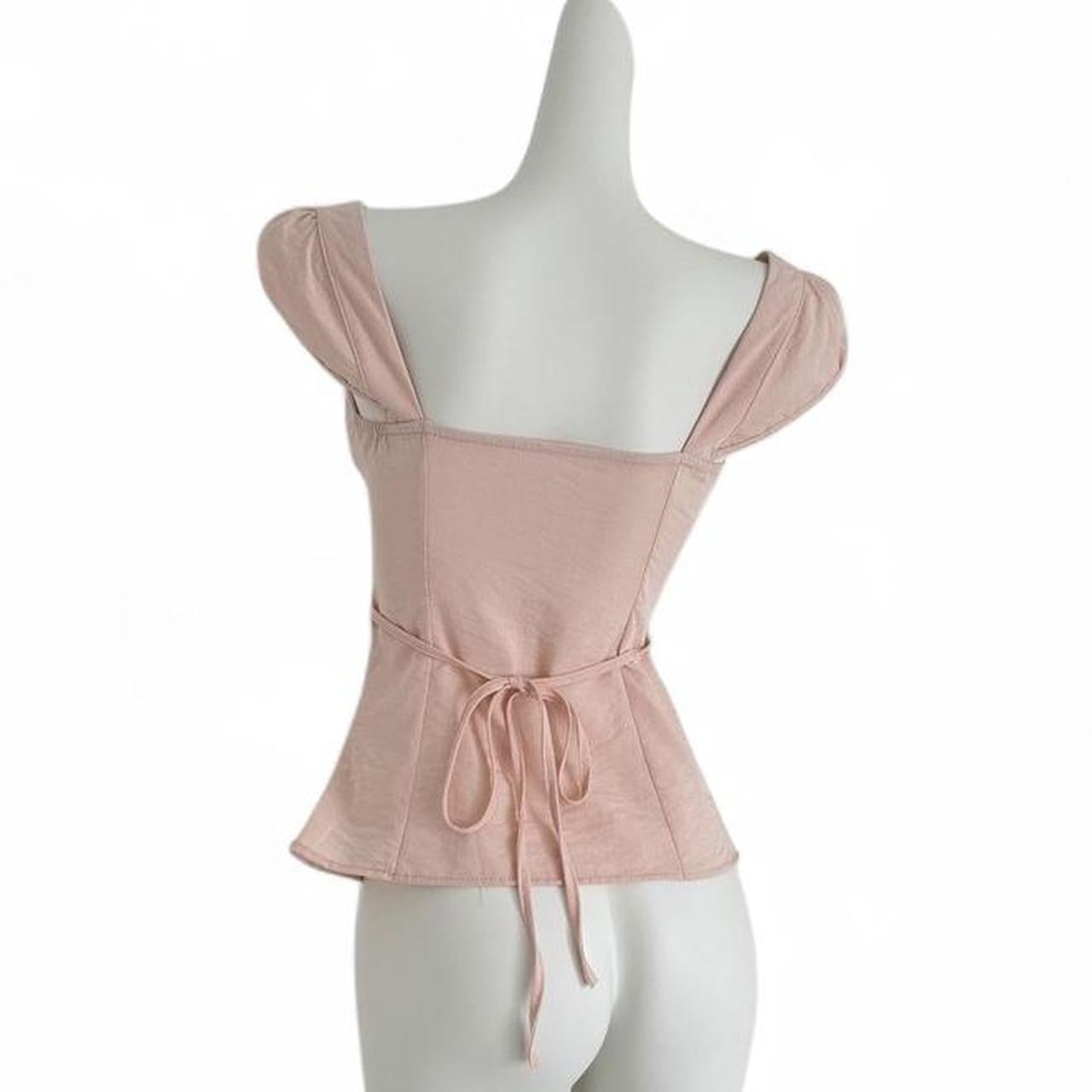 pink corset top with button up front and tie back