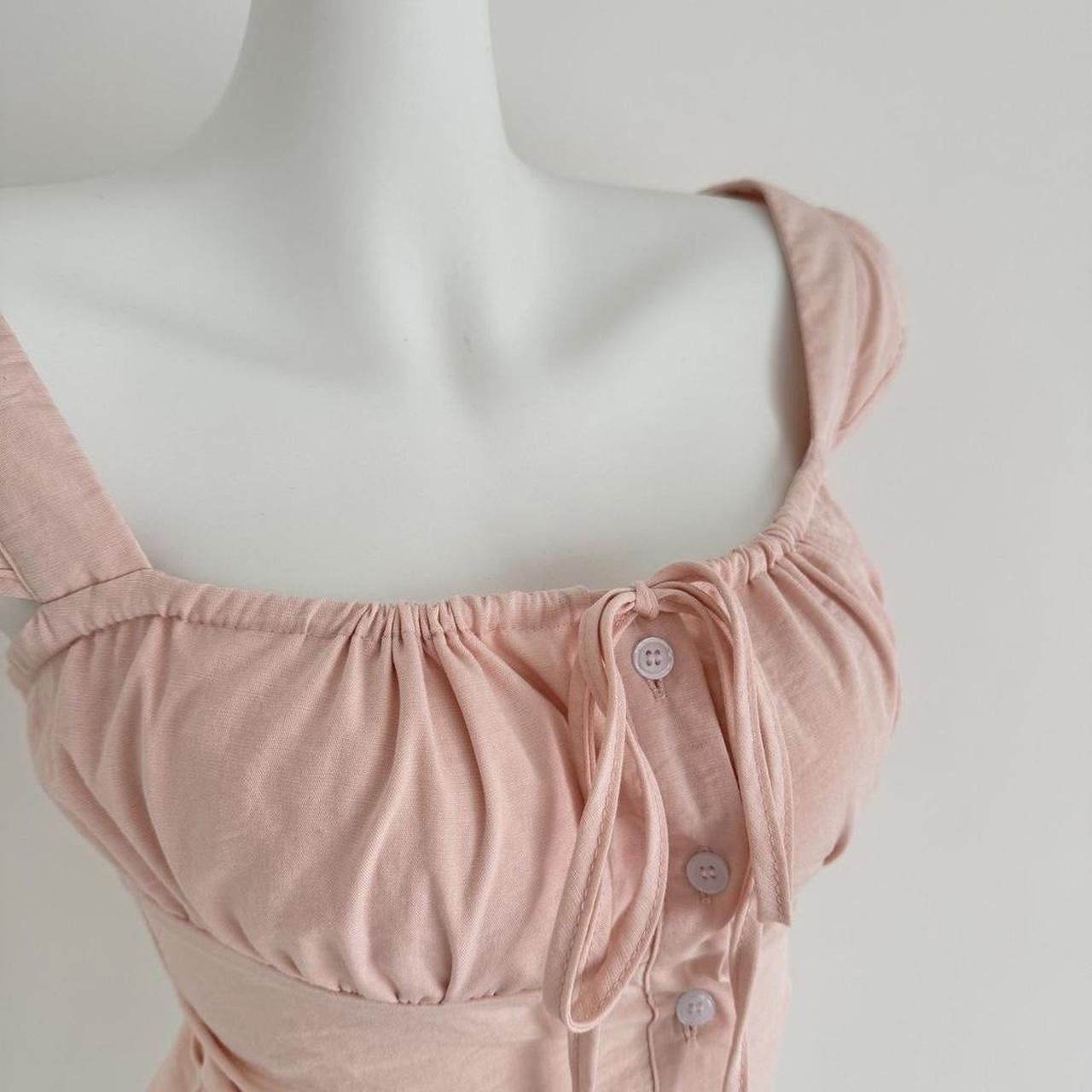 pink corset top with button up front and tie back