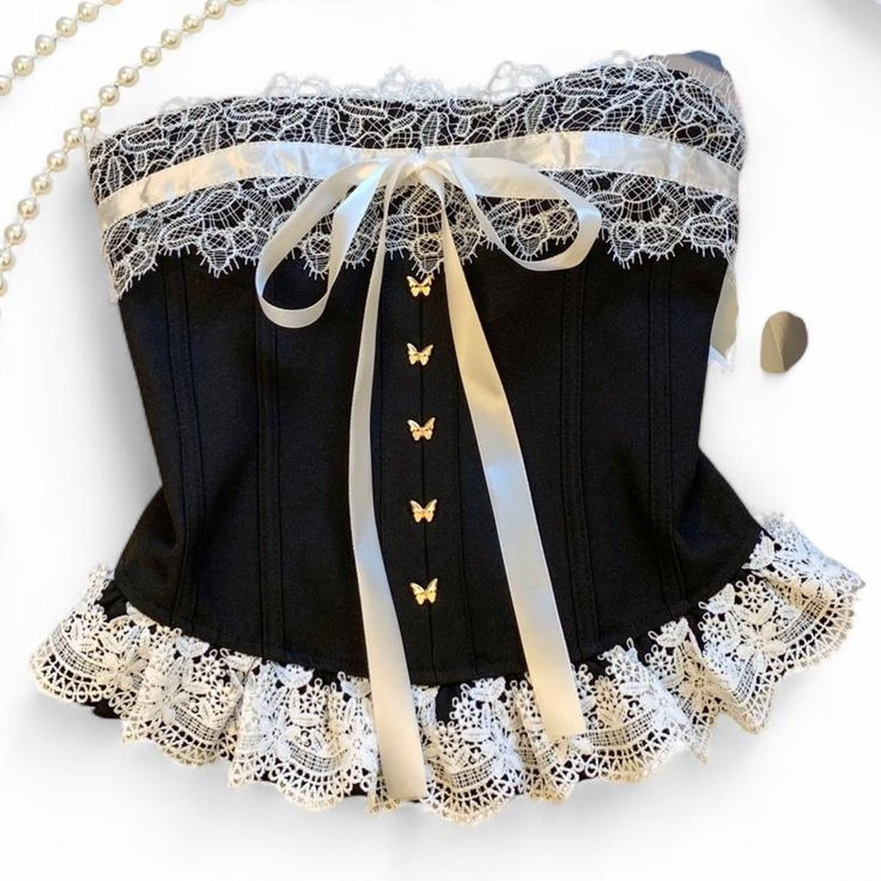 corset top with lace and bow details