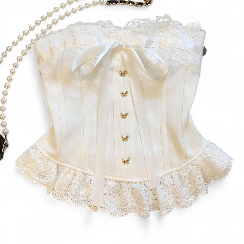 corset top with lace and bow details