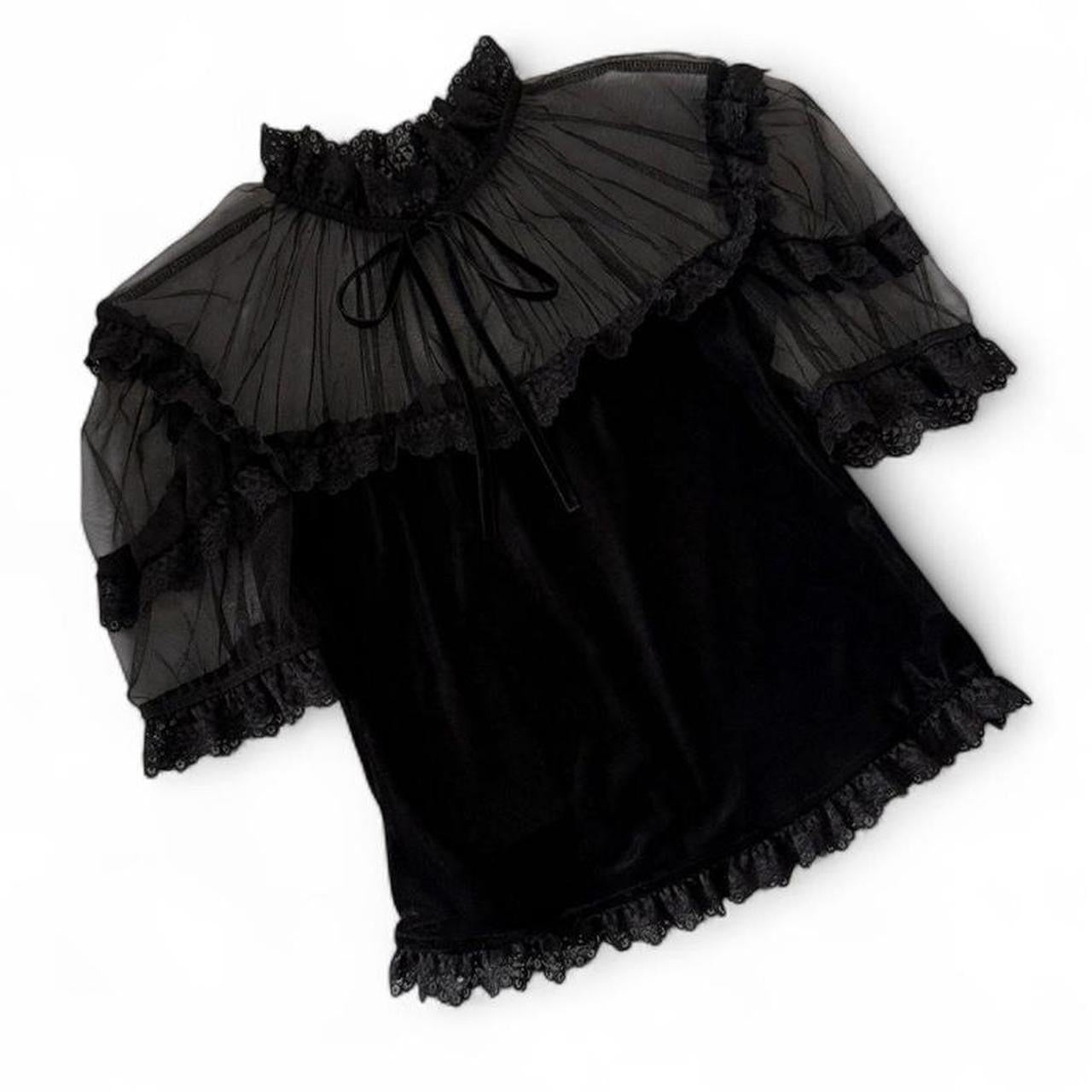 black velvet top with lace trim and bow detail