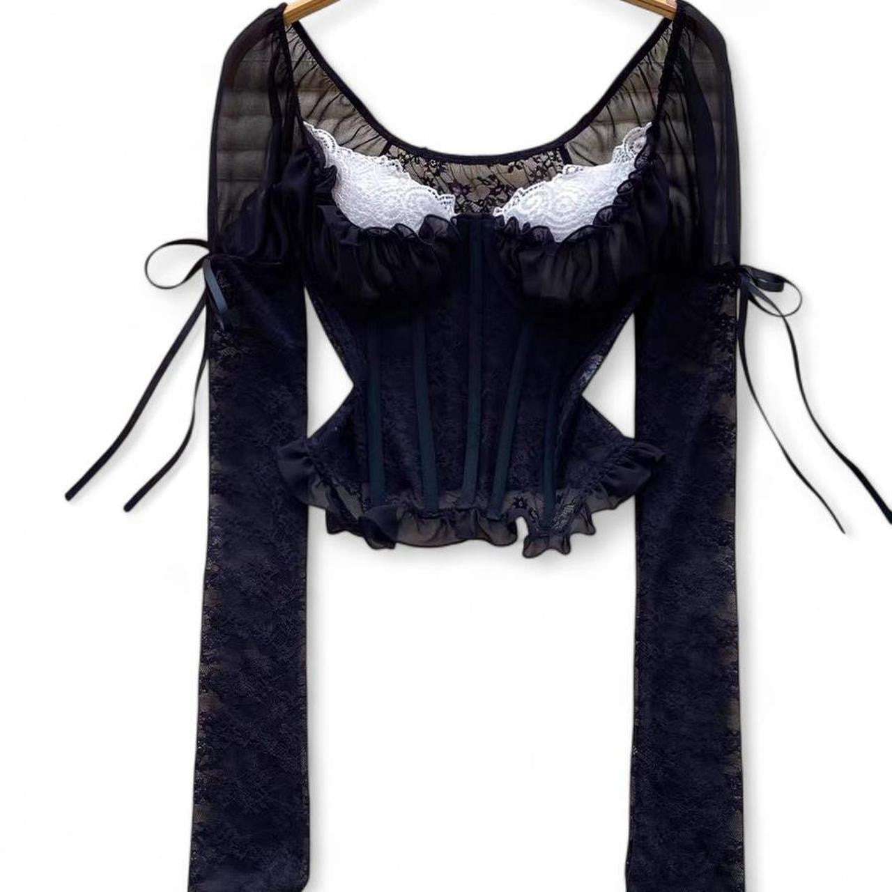 black lace corset top with sheer sleeves and ruffles