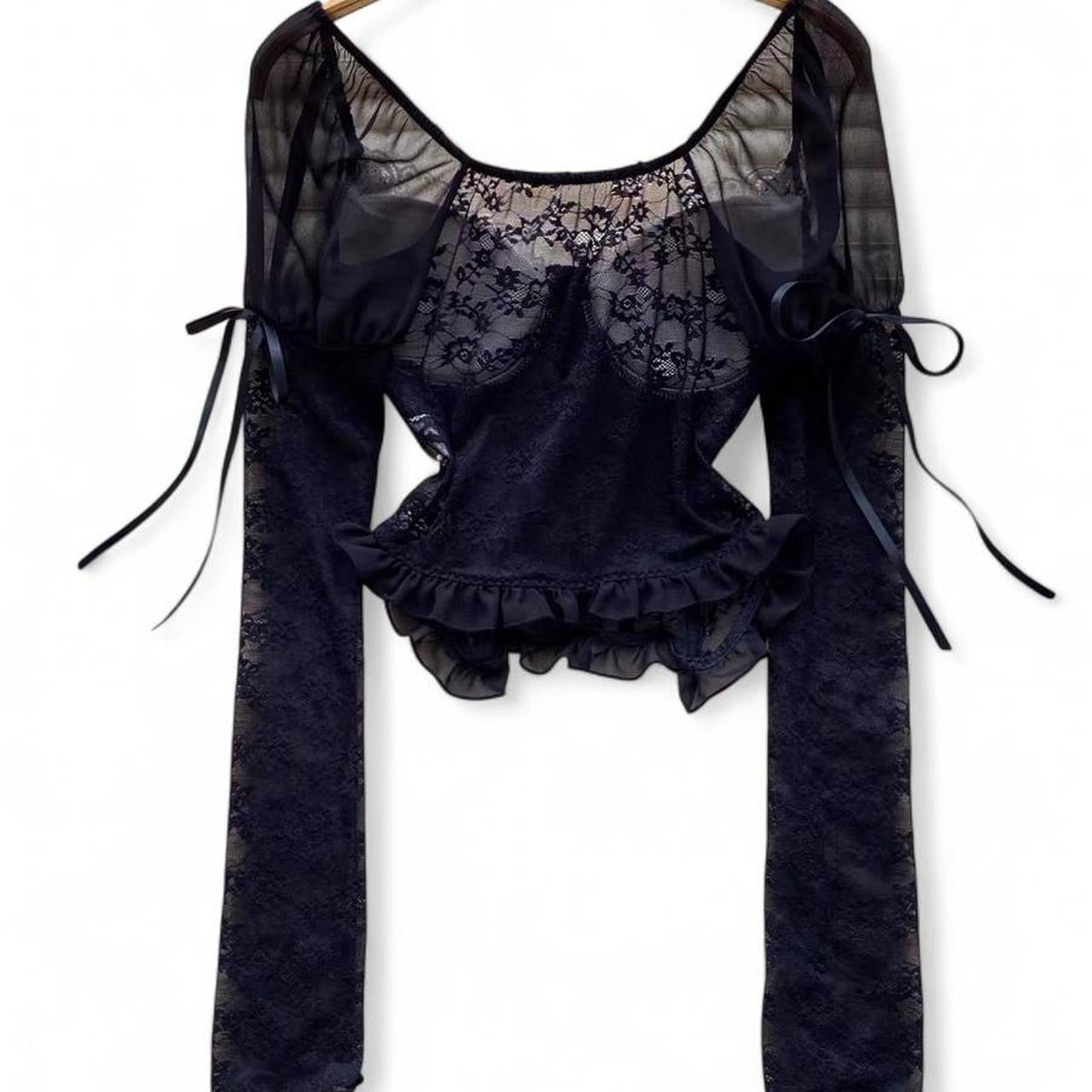 black lace corset top with sheer sleeves and ruffles