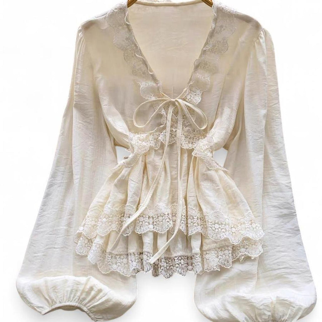 cream lace blouse with bow detail