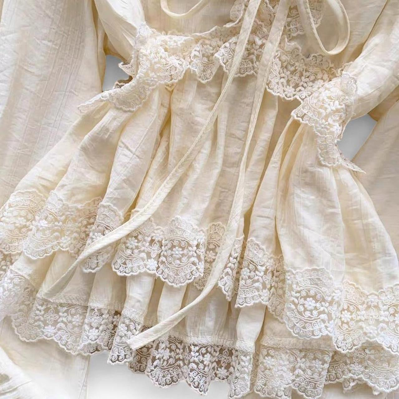cream lace blouse with bow detail