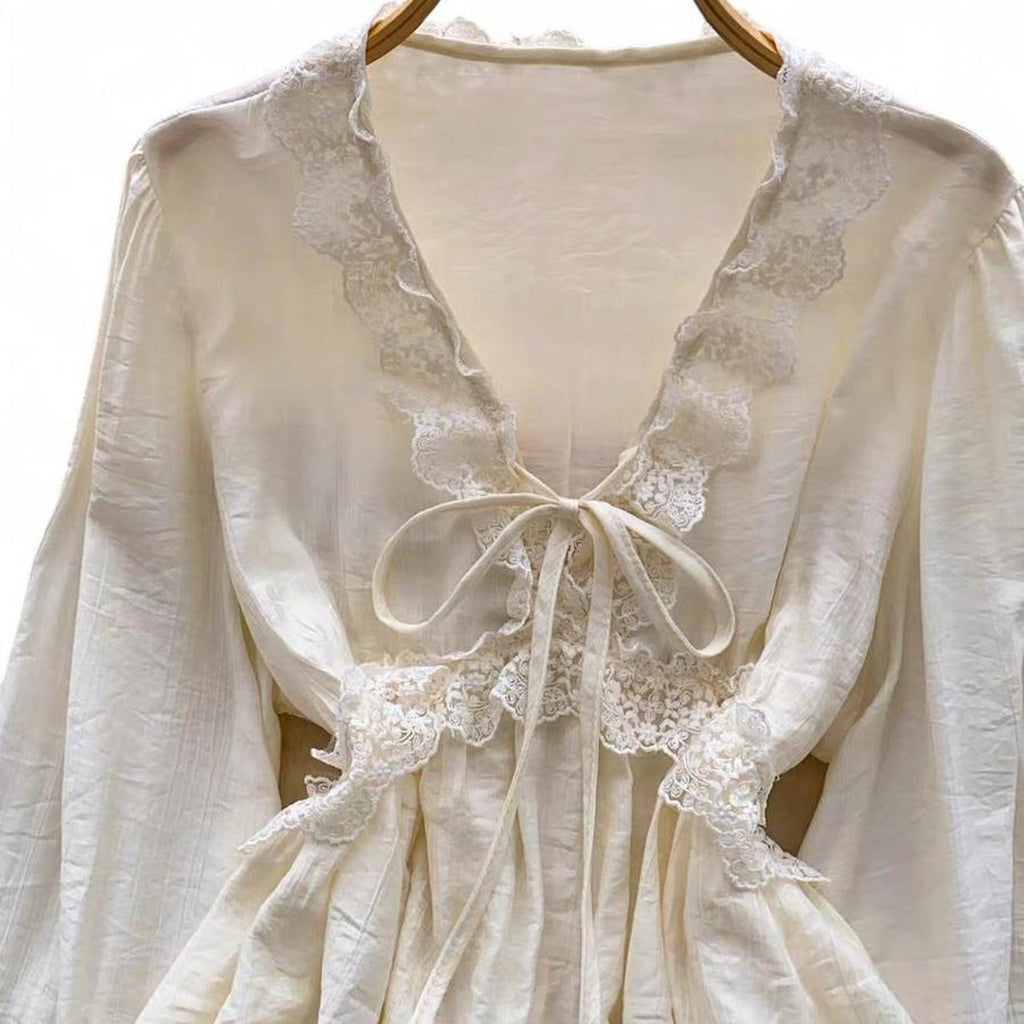 cream lace blouse with bow detail