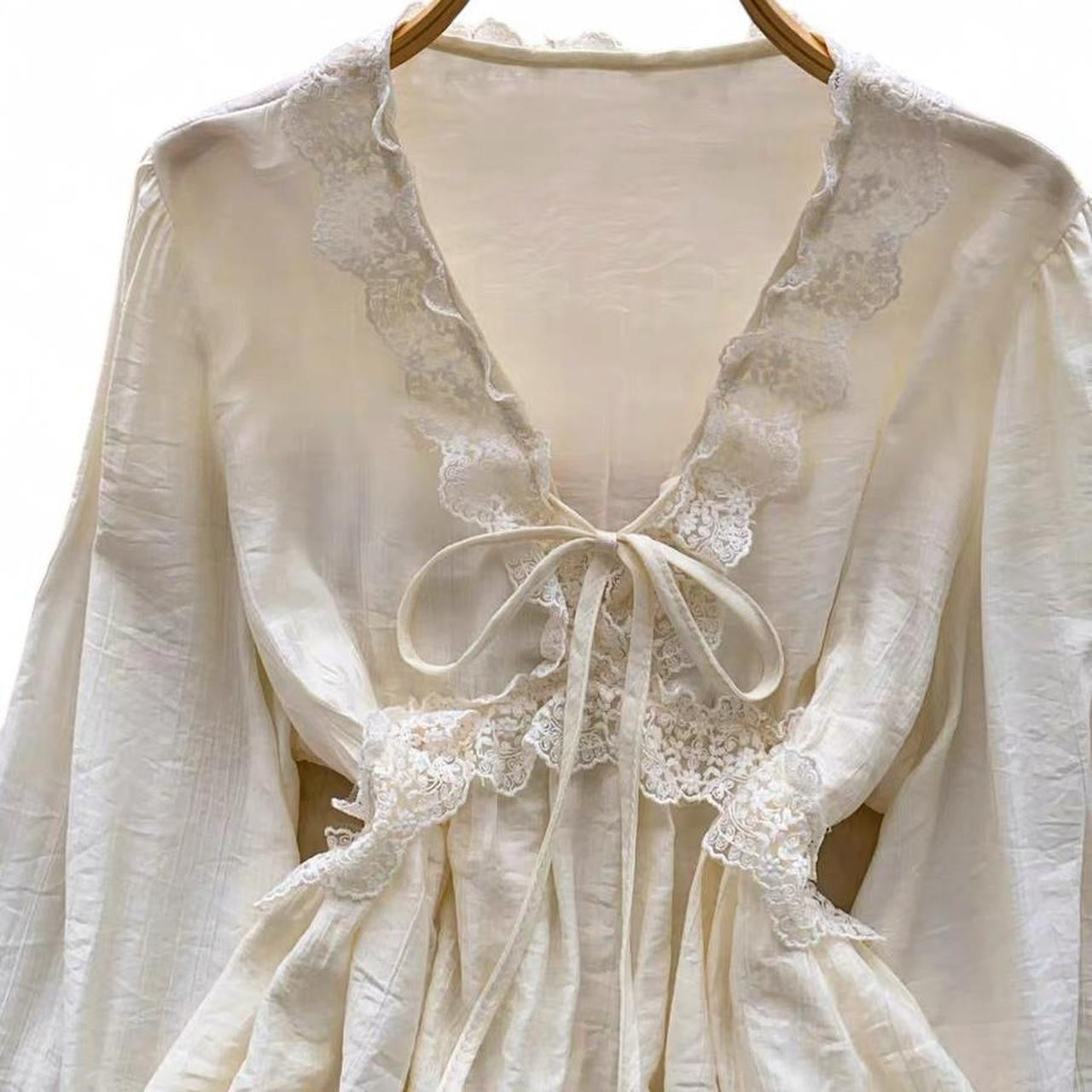 cream lace blouse with bow detail