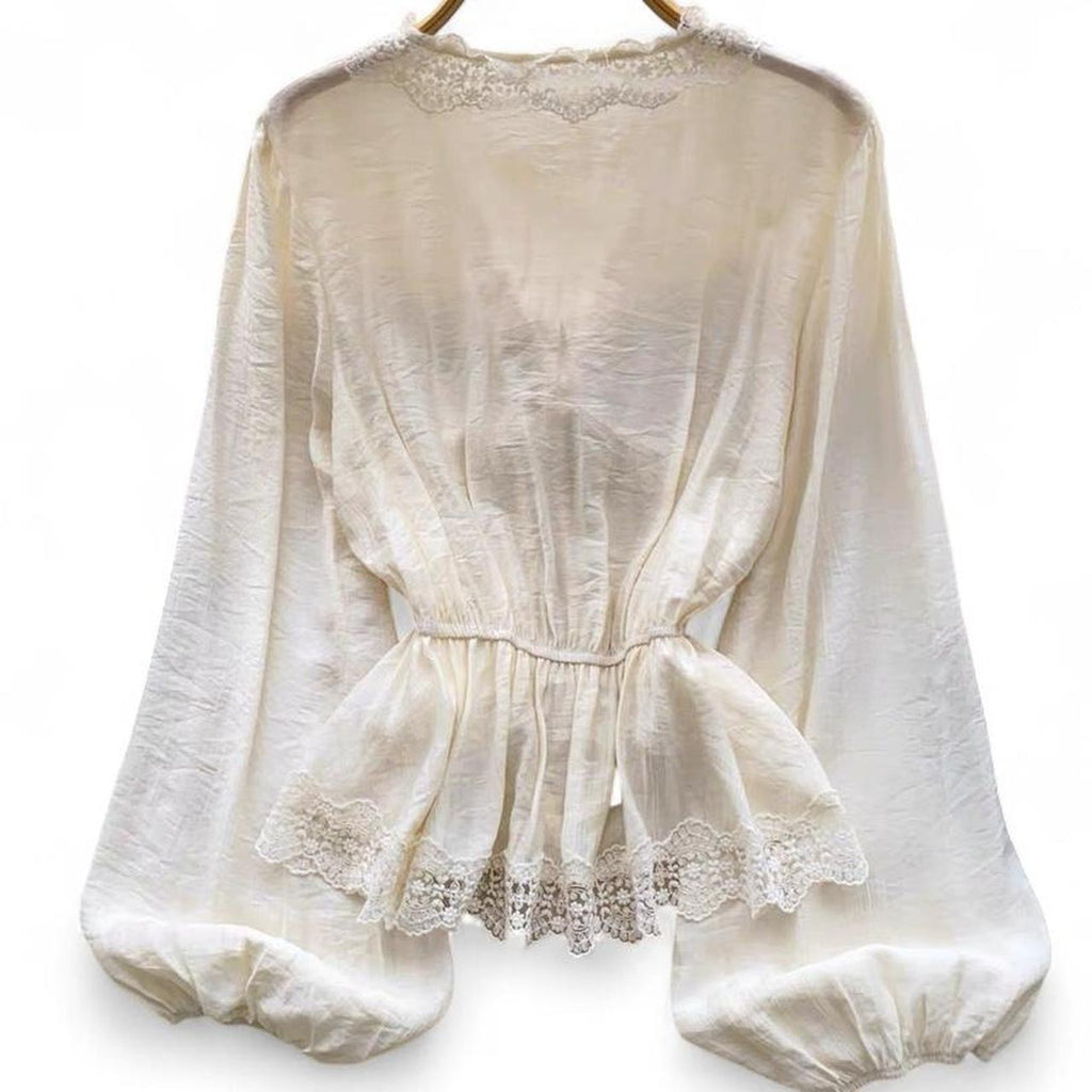 cream lace blouse with bow detail