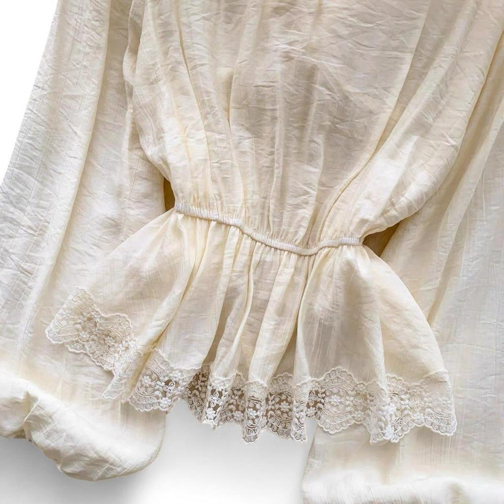 cream lace blouse with bow detail