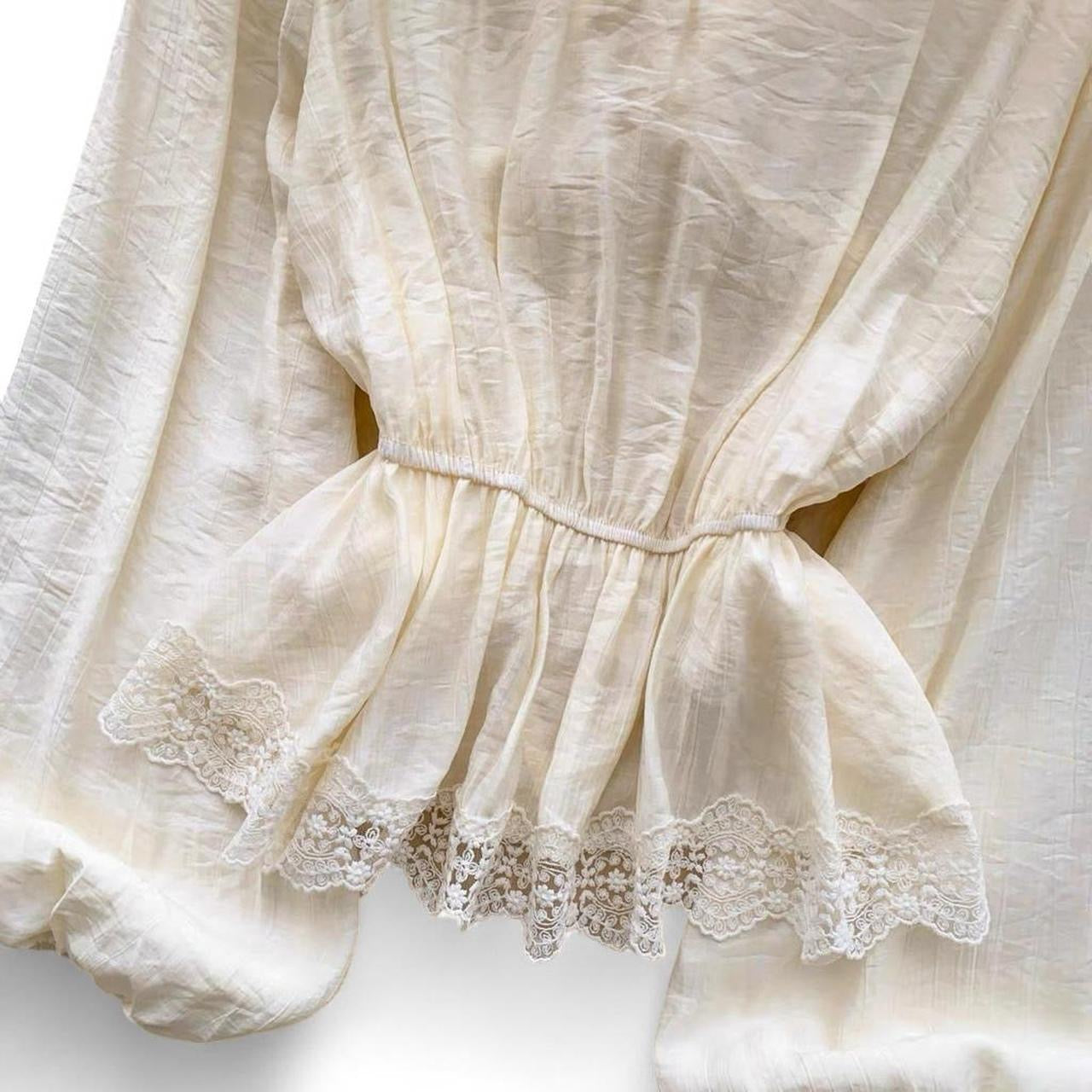 cream lace blouse with bow detail