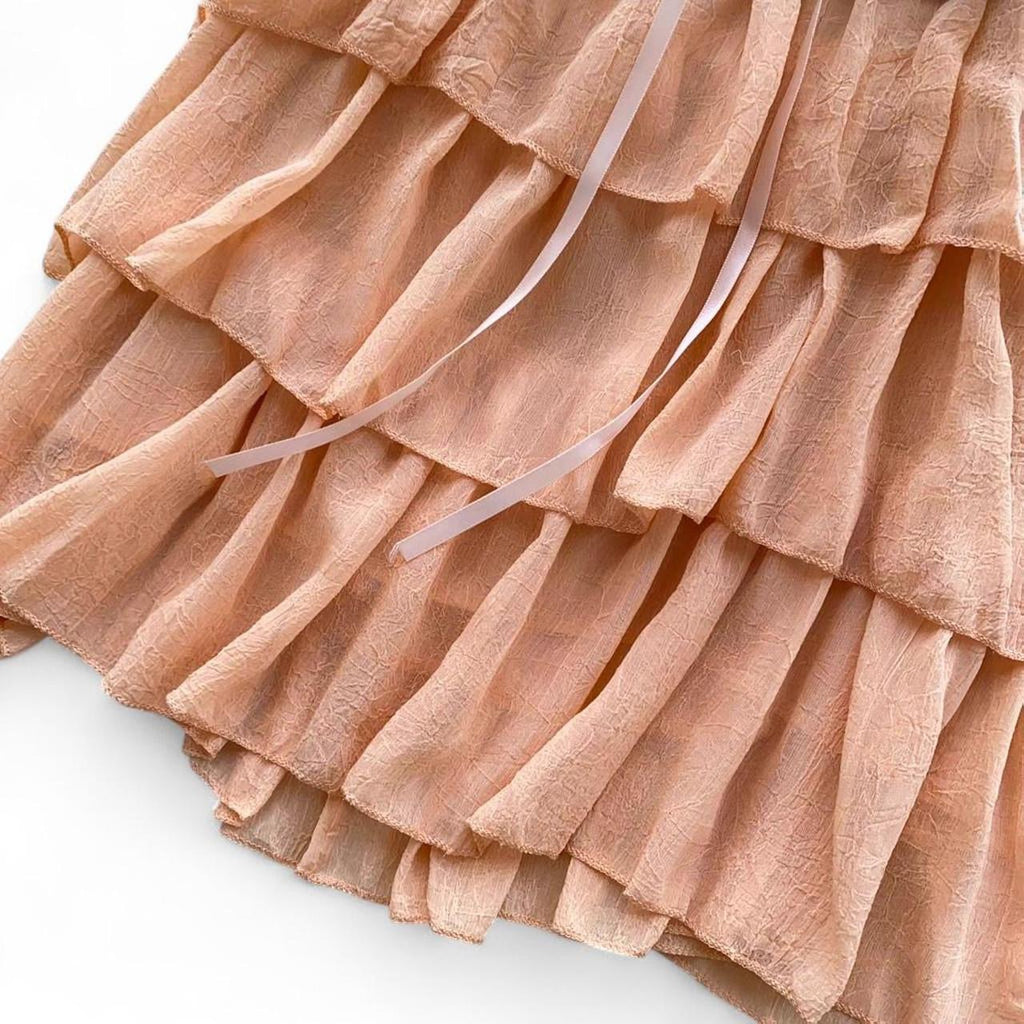 ruffled top with bow