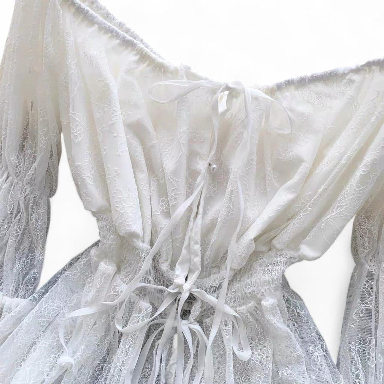 white lace off the shoulder blouse with bell sleeves and tie back