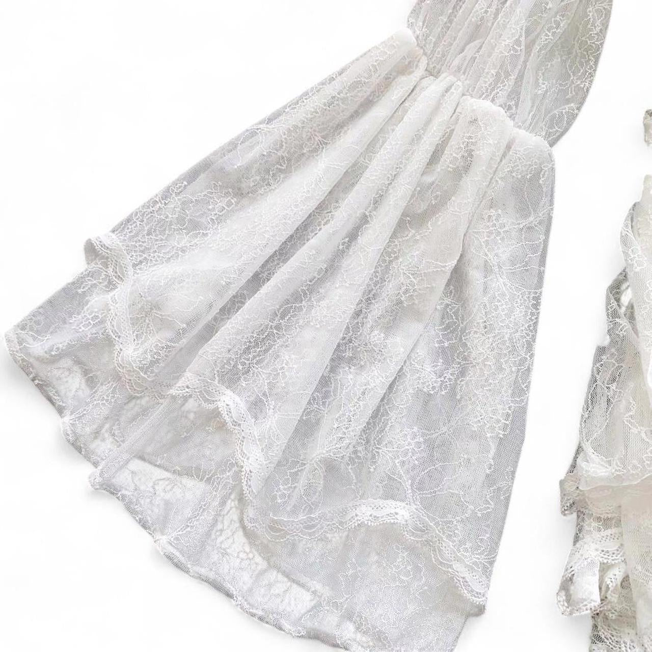 white lace off the shoulder blouse with bell sleeves and tie back